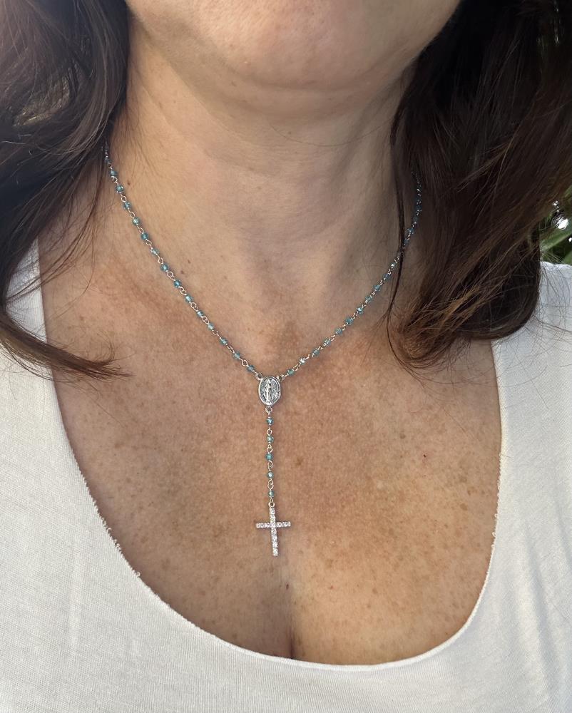 Necklace with cross and blue zircons